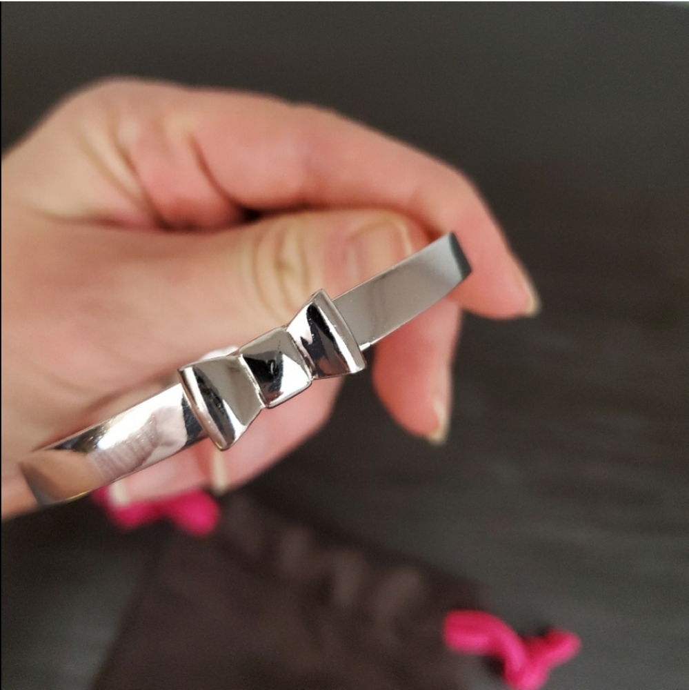 Kate Spade "take a bow" silver bangle bracelet